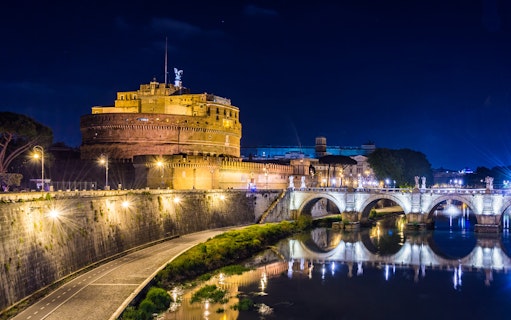 Castel Sant'Angelo and Ponte Sant'Angelo illuminated at night, Rome.