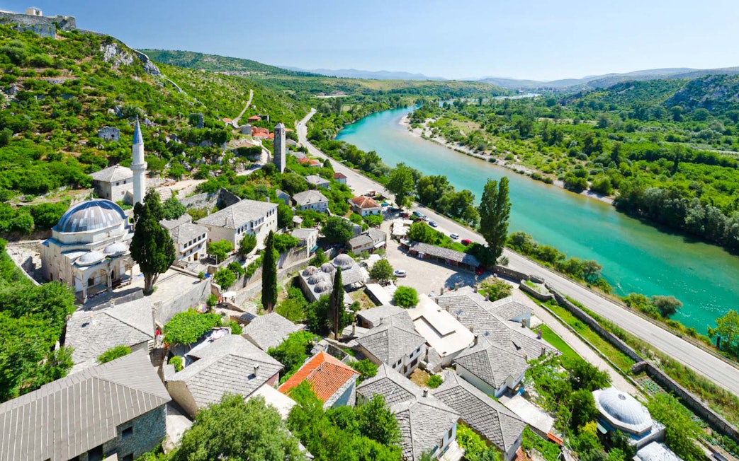 Aerial view of Mostar with Neretva River and historic buildings, Bosnia and Herzegovina.