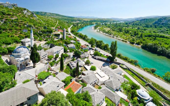 Aerial view of Mostar with Neretva River and historic buildings, Bosnia and Herzegovina.