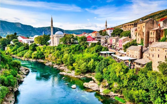 Mostar's Old Town with Neretva River and mosque, Bosnia and Herzegovina.