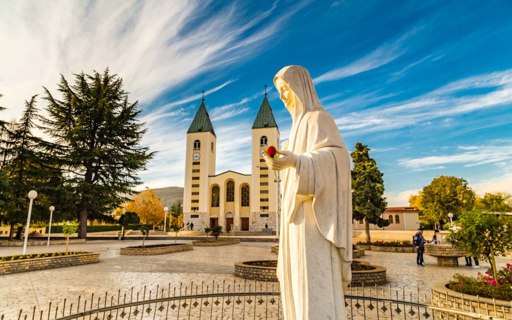 Statue of Virgin Mary in front of St. James Church, Medjugorje, Bosnia and Herzegovina.
