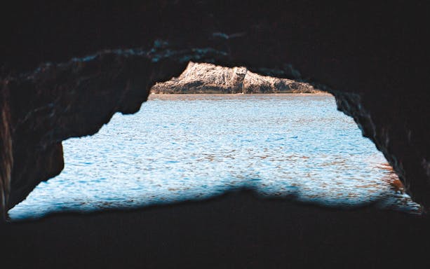 View from inside Blue Cave, Hvar, showing the sea and rocky entrance.