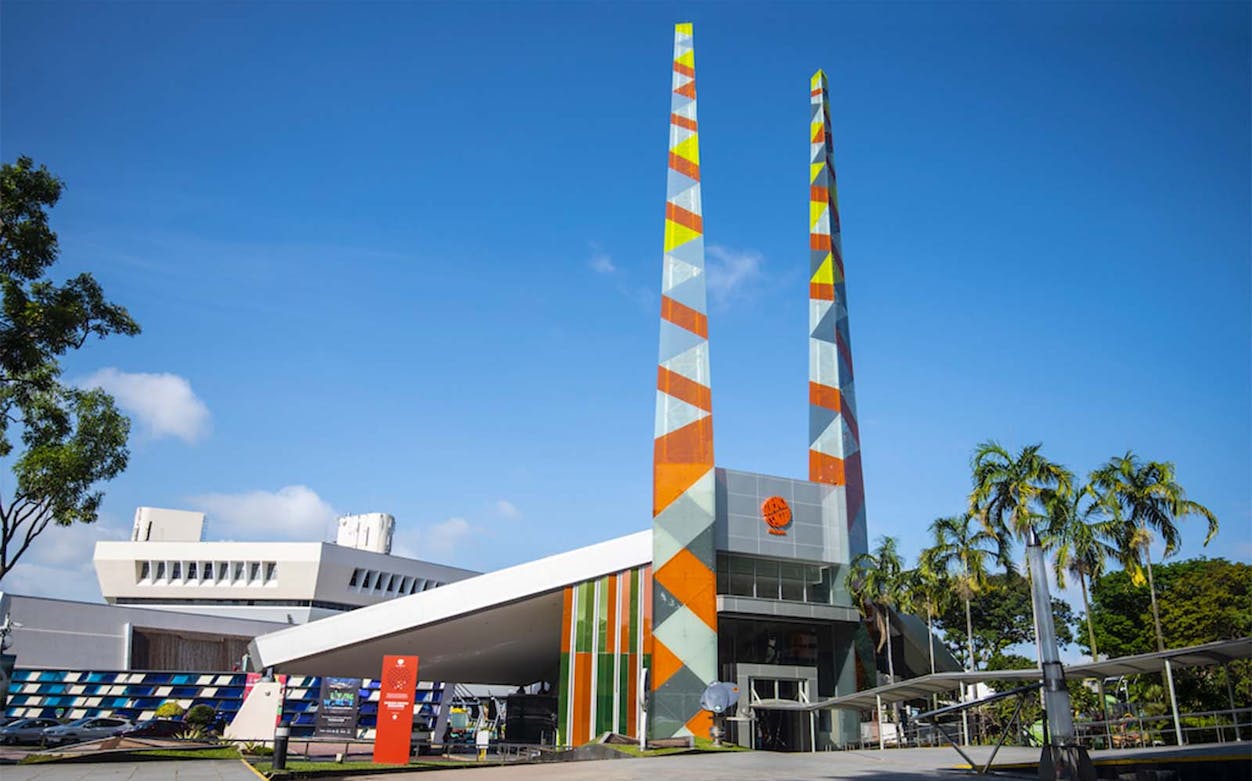 Modern science center with colorful towers and palm trees, Science Centre-4.
