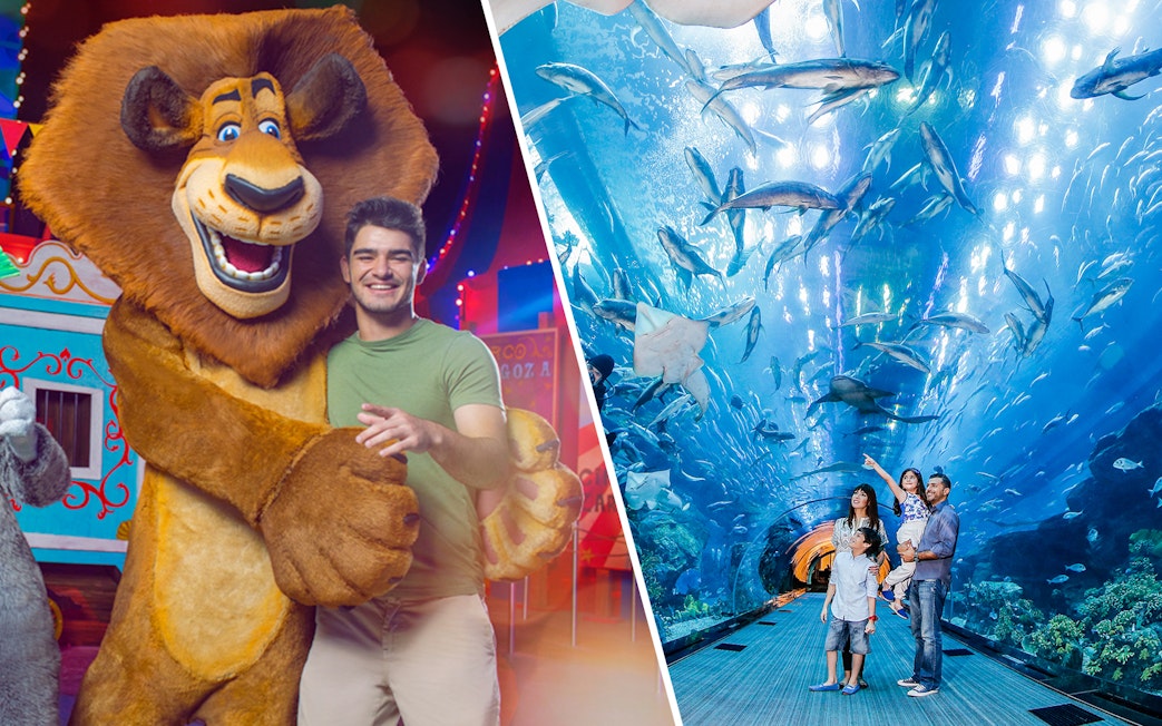 MOTIONGATE™ Dubai character with visitor; family exploring Dubai Aquarium tunnel with marine life.