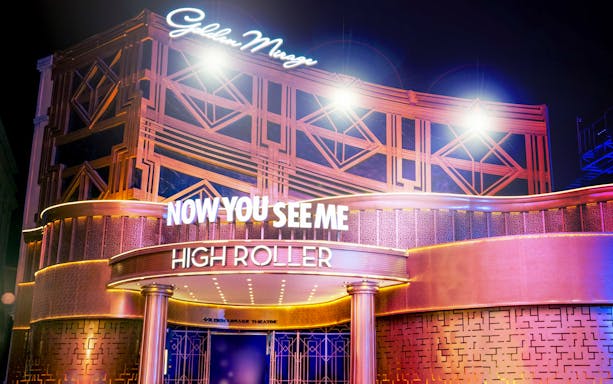 MOTIONGATE™ Dubai Now You See Me High Roller entrance at night.