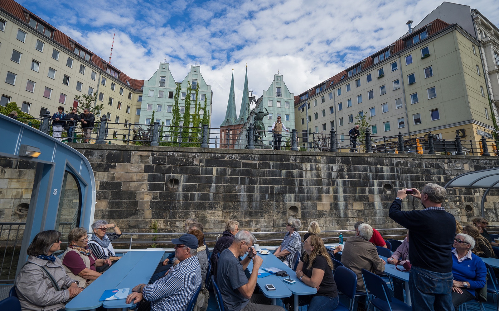 Berlin cityscape with boat cruising on the Spree River during 2.5-hour city boat tour to West Harbor.