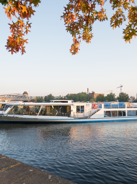 Boat on Berlin's Spree River near West Harbor during city tour.
