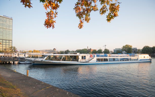 Boat on Berlin's Spree River near West Harbor during city tour.