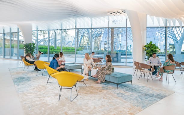 Visitors relaxing in the lounge at The View at the Palm, Dubai.