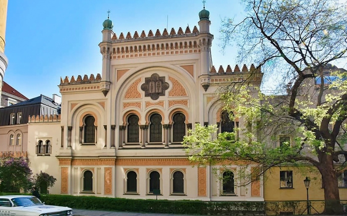 Prague Jewish Town synagogue exterior with ornate architecture.