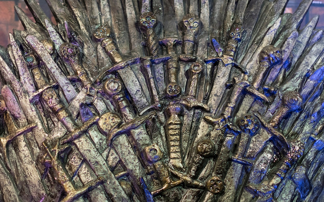 Iron Throne replica from Game of Thrones tour in Split, featuring swords and intricate details.