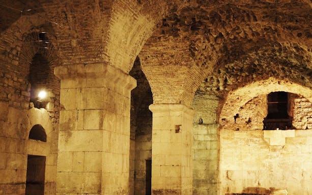 Diocletian's Cellar in Split, stone arches and walls from Game of Thrones tour.