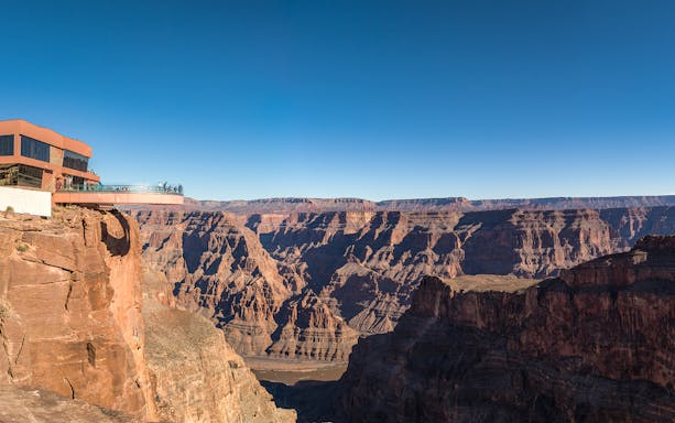 Grand Canyon West Rim with Skywalk overlooking canyon landscape.