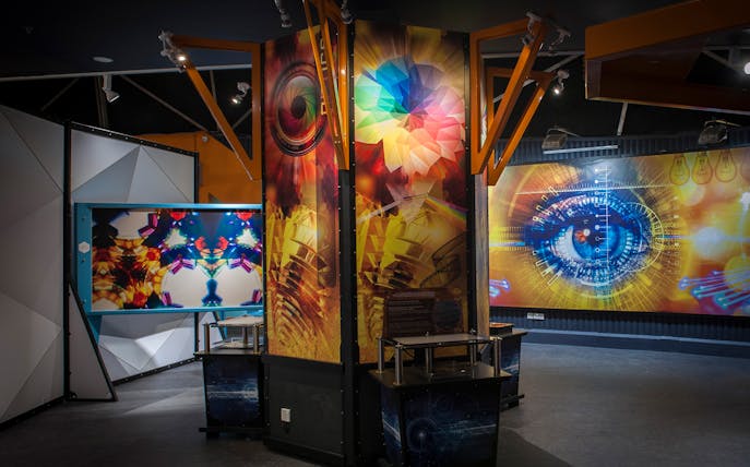 Interactive exhibit with colorful digital displays at Tech Dome Penang.