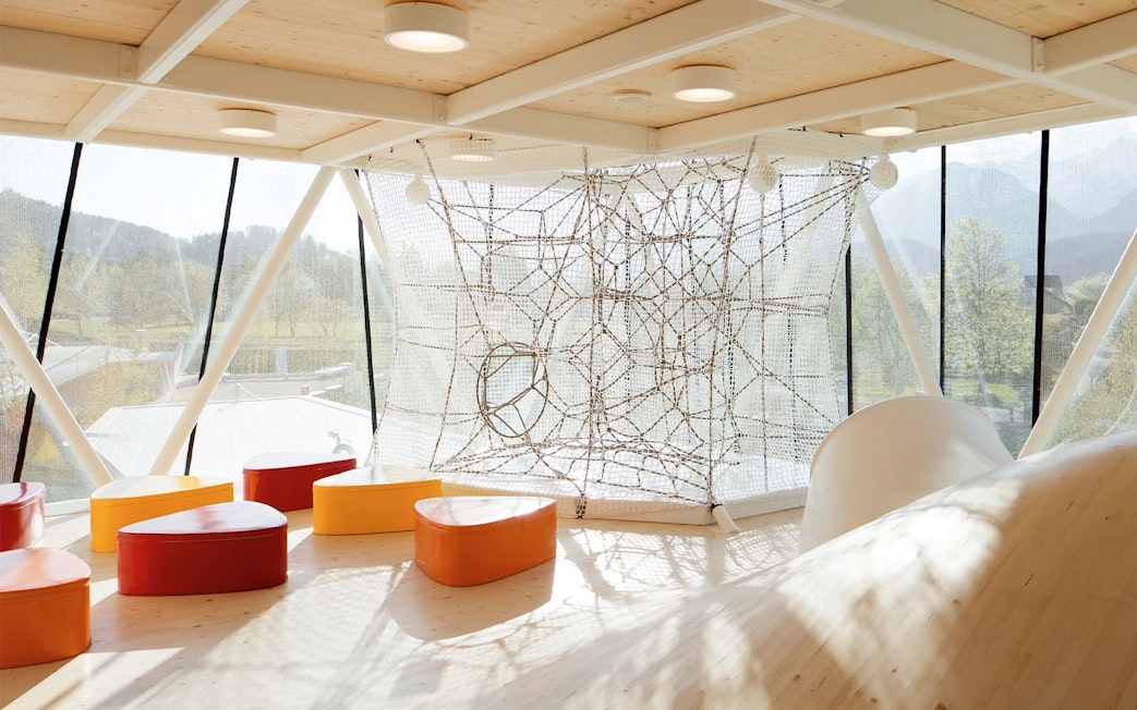 Visitors at Swarovski Crystal Worlds entrance, Innsbruck, Austria, using skip-the-line tickets.