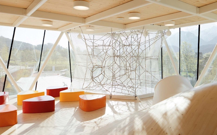 Visitors at Swarovski Crystal Worlds entrance, Innsbruck, Austria, using skip-the-line tickets.