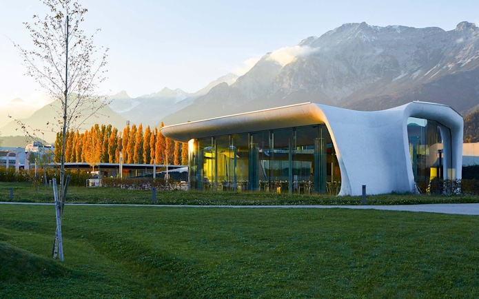 Swarovski Crystal Worlds entrance with mountain backdrop in Innsbruck, Austria.