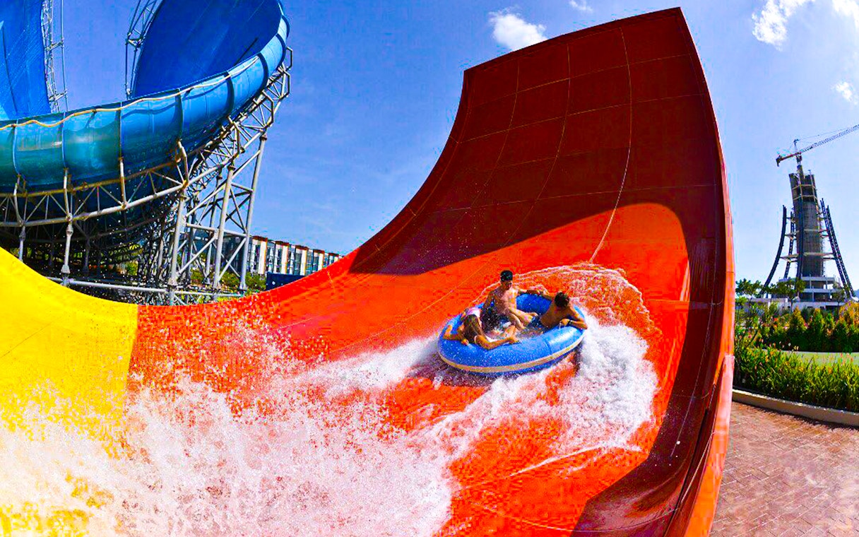 Visitors on a water slide at Splash Out Langkawi Water Theme Park.
