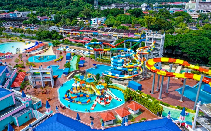 Water park with colorful slides and pools in Langkawi, Malaysia, part of Splash Out tour.