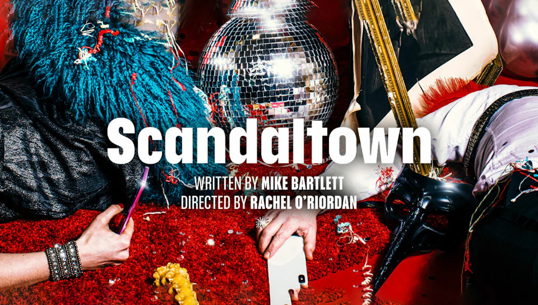 Scandaltown play poster with disco ball and colorful costumes.