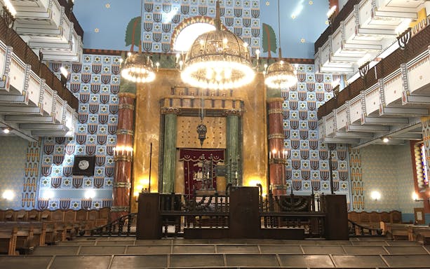 Dohany Street Synagogue interior with ornate chandeliers and decorative walls, Budapest.
