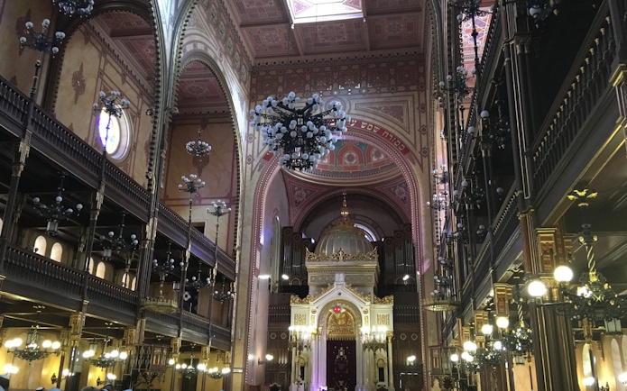 Dohany Street Synagogue interior with ornate arches and chandeliers, Budapest.