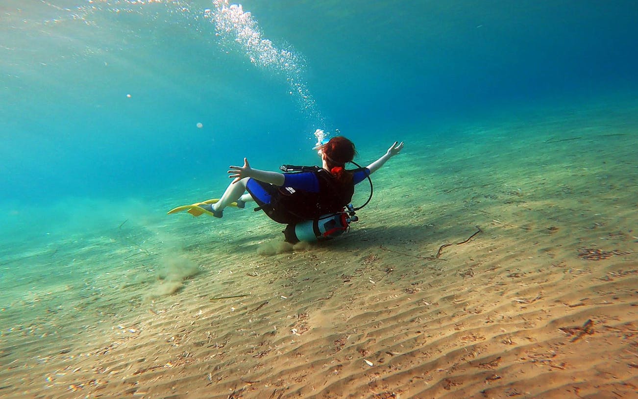 Scuba diver exploring underwater in Nea Makri, Athens.