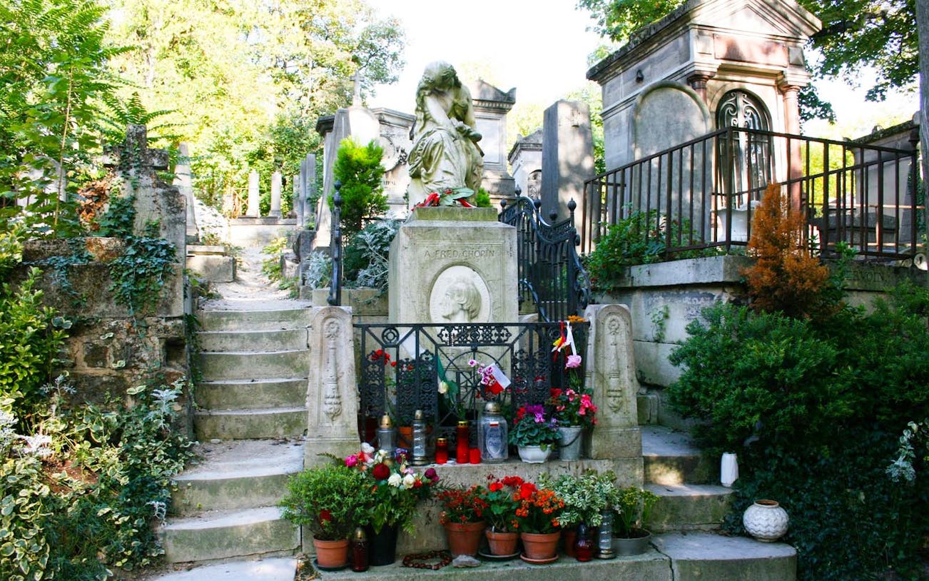 Tomb of Frédéric Chopin with flowers at Père Lachaise Cemetery, Paris.