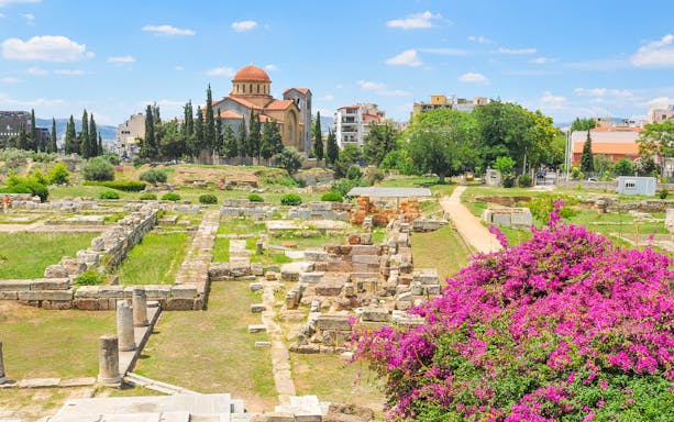 Kerameikos archaeological site with ancient ruins and church in Athens, Greece.