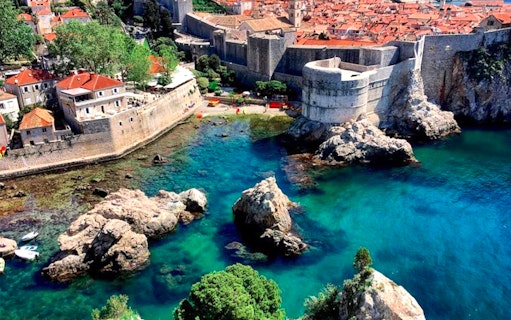 Aerial view of Dubrovnik's Old Town walls and coastline, Croatia.