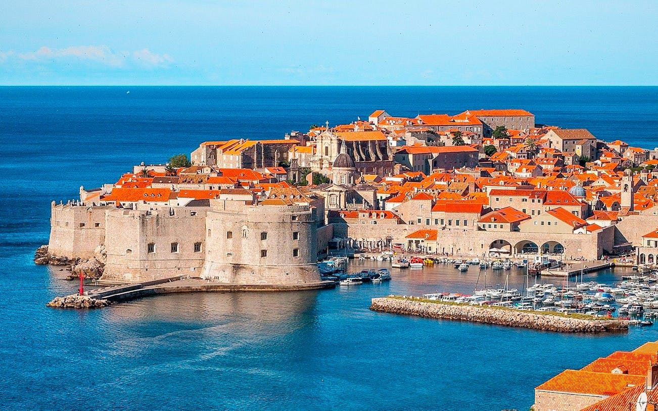 Dubrovnik City Walls overlooking the Adriatic Sea, ideal for early bird or sunset tours.
