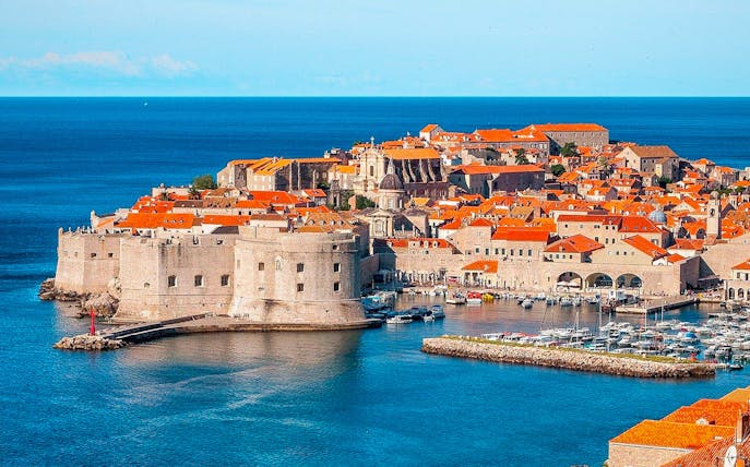 Dubrovnik City Walls overlooking the Adriatic Sea, ideal for early bird or sunset tours.