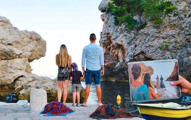 Family at Dubrovnik's Game of Thrones filming location by the sea.
