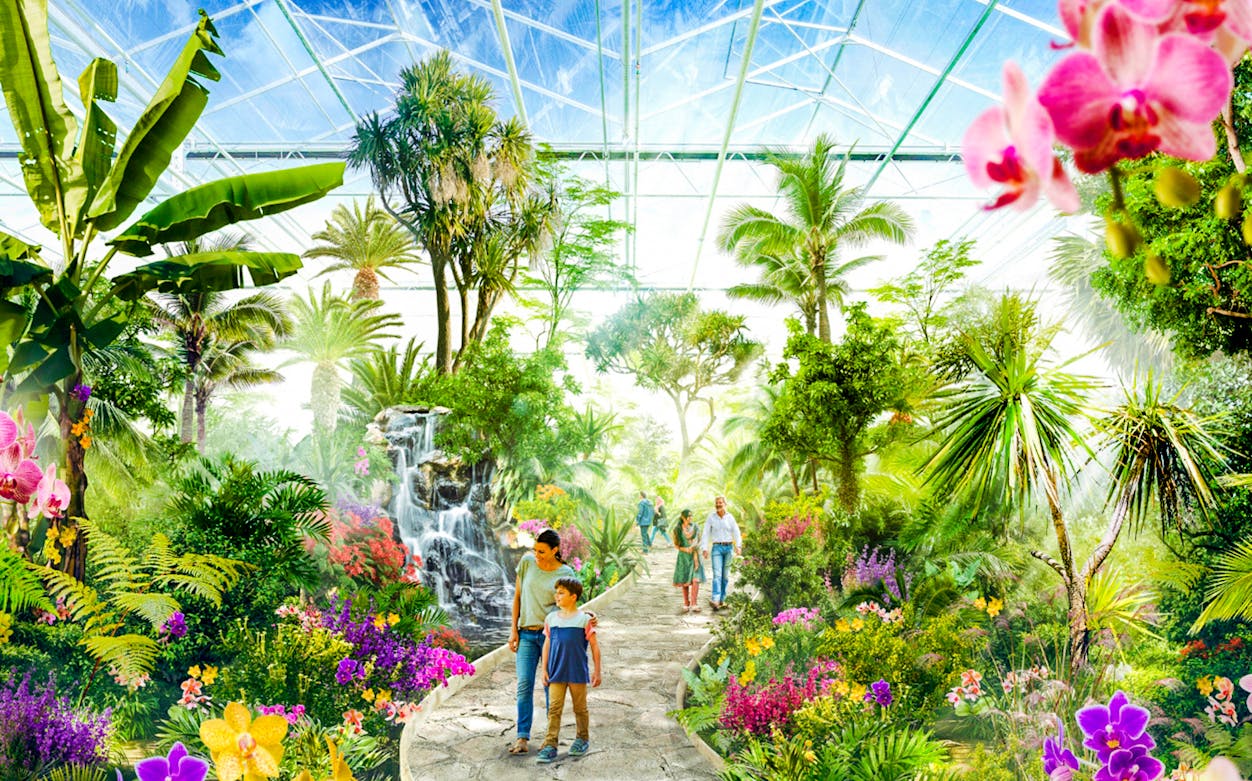 Visitors walking through lush gardens at Floriade Horticultural Expo, Amsterdam.