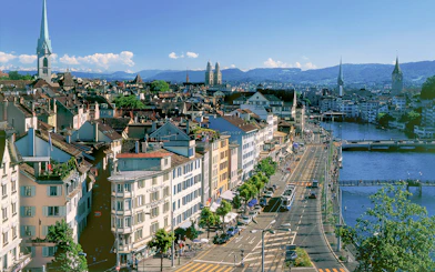 Aerial view of Zurich's historic district with Fraumünster Church and Limmat River, part of The ZURICH Experience Tour.