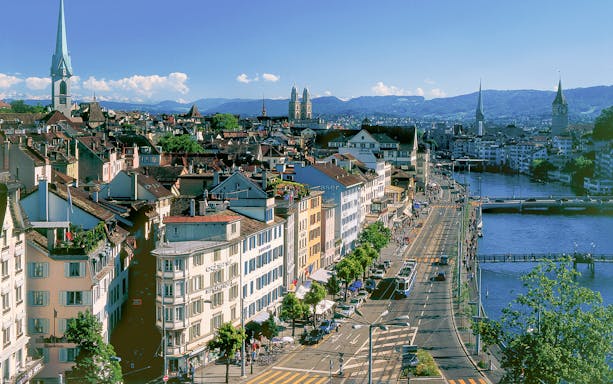 Aerial view of Zurich's historic district with Fraumünster Church and Limmat River, part of The ZURICH Experience Tour.