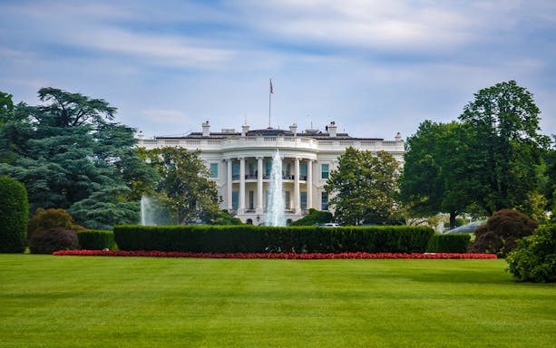 White House with fountain and gardens, Washington, DC bus tour.