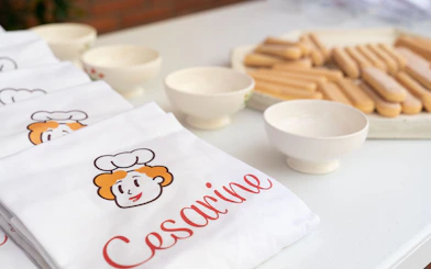 Aprons and ingredients for a private cooking class in Bologna.