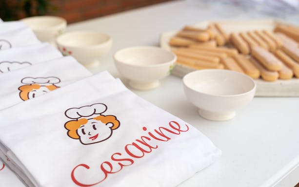 Aprons and ingredients for a private cooking class in Bologna.