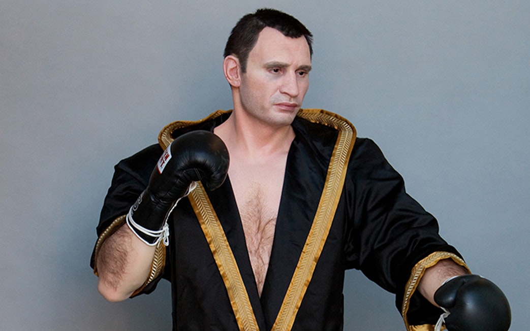 Wax figure of a boxer in black robe at Panoptikum - Das Wachsfigurenkabinett.