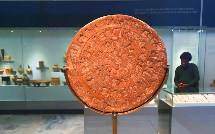 Phaistos Disc exhibit at Heraklion Archaeological Museum, Crete.