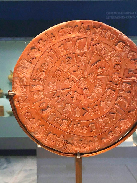 Phaistos Disc exhibit at Heraklion Archaeological Museum, Crete.