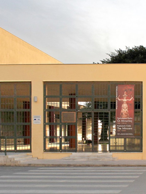 Heraklion Archaeological Museum entrance with exhibition banners, Crete.