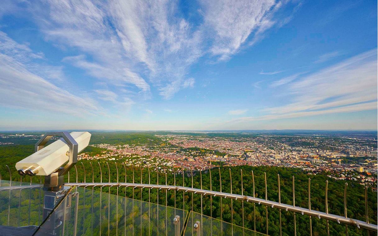 View from Fernsehturm Stuttgart overlooking the city and surrounding forest.