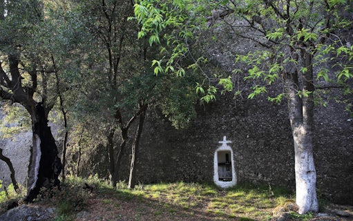 Hidden shrine in forest along Meteora hiking trail, Greece.