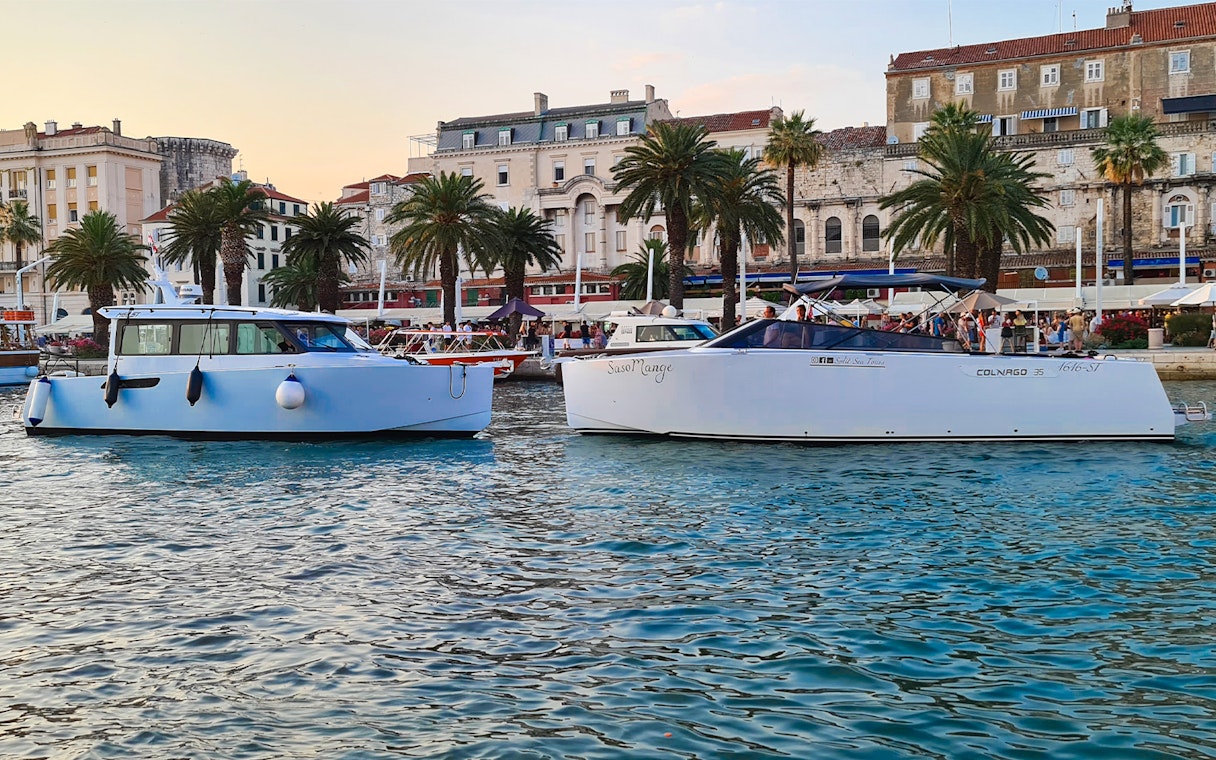 Boats docked in Split harbor, Croatia, for a full-day tour to Blue Cave, Vis, and Hvar.