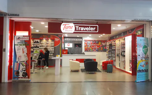 Kuala Lumpur airport SIM card store with travel WiFi rental services.