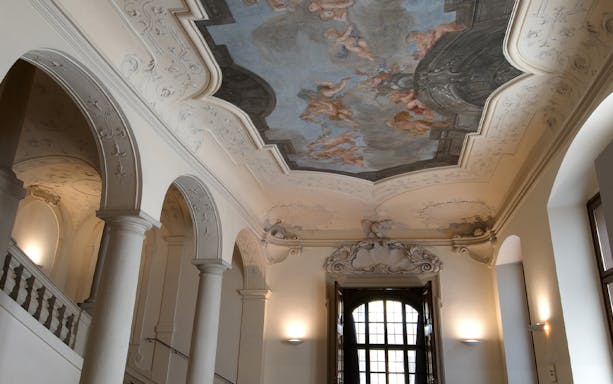 Ceiling fresco and arches inside Theatre Museum.