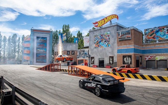 Stunt cars performing at Hot Wheels City in Mirabilandia theme park.