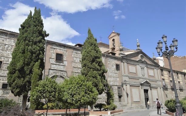 Monasterio de las Descalzas facade with visitors, Madrid.